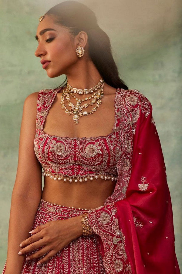 Desirable Red Color Silk  Fabric Wedding Lehenga