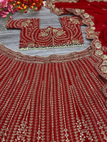 Desirable Red Color Silk  Fabric Wedding Lehenga