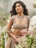 Desirable Cream Color Net Fabric Wedding Lehenga