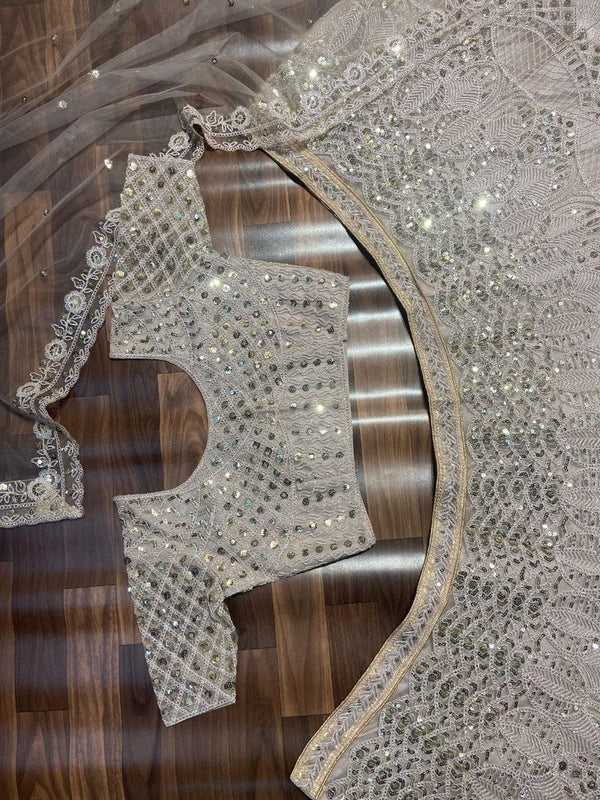 Desirable Cream Color Net Fabric Wedding Lehenga