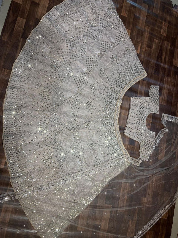 Desirable Cream Color Net Fabric Wedding Lehenga