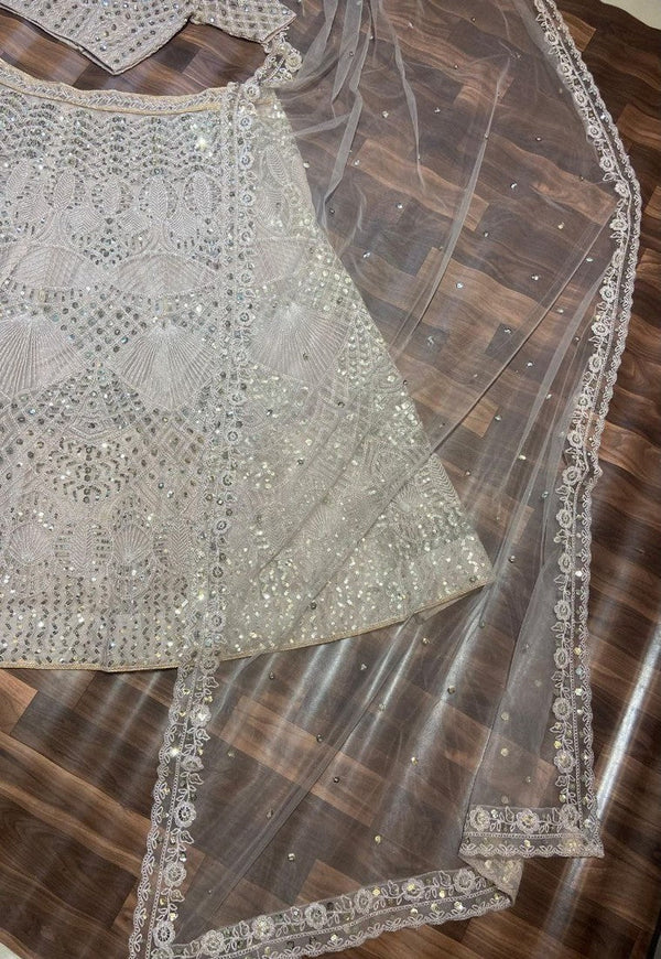 Desirable Cream Color Net Fabric Wedding Lehenga