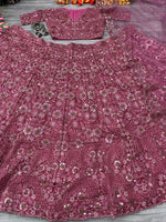 Desirable Pink Color Silk  Fabric Wedding Lehenga