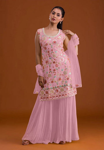 Tasteful Pink Color Georgette Fabric Plazzo Suit