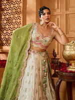 Charming Cream Color Tissue Fabric Party Wear Lehenga