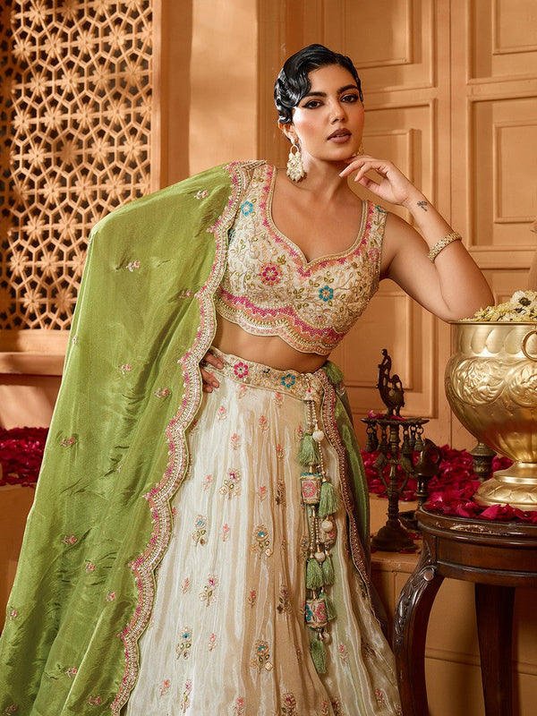 Charming Cream Color Tissue Fabric Party Wear Lehenga