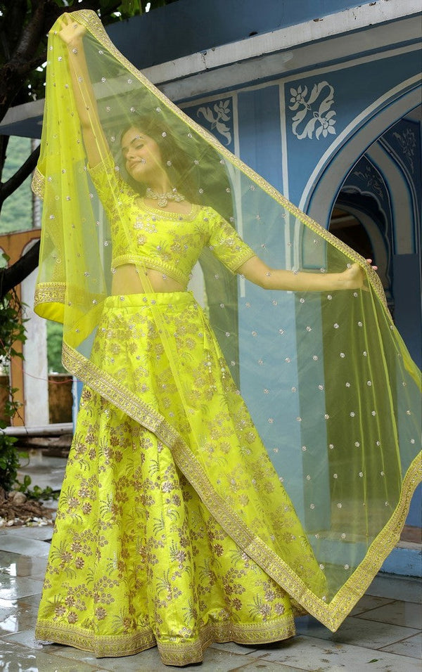 Glowing Yellow Color Silk Fabric Party Wear Lehenga