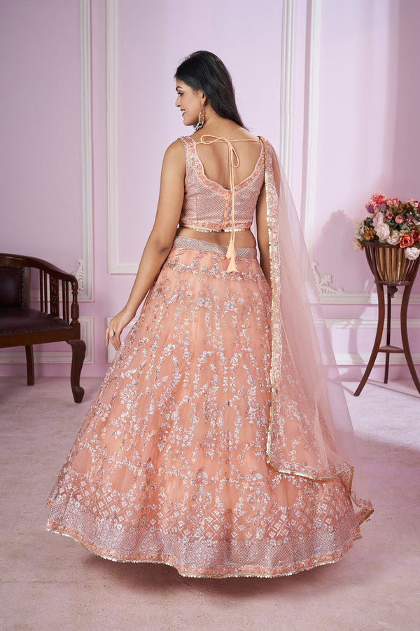 Charming Peach Color Net Fabric Party Wear Lehenga