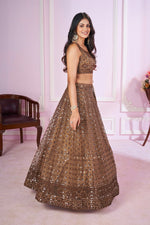 Charming Beige Color Net Fabric Party Wear Lehenga