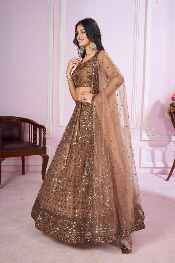 Charming Beige Color Net Fabric Party Wear Lehenga