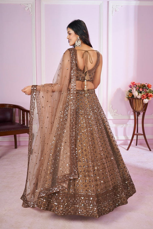 Charming Beige Color Net Fabric Party Wear Lehenga