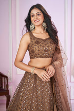 Charming Beige Color Net Fabric Party Wear Lehenga