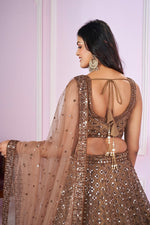 Charming Beige Color Net Fabric Party Wear Lehenga