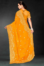 Lovely Mustard Color Silk Fabric Partywear Saree