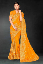 Lovely Mustard Color Silk Fabric Partywear Saree