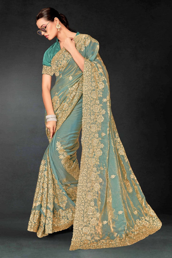 Lovely Turquoise Color Silk Fabric Partywear Saree