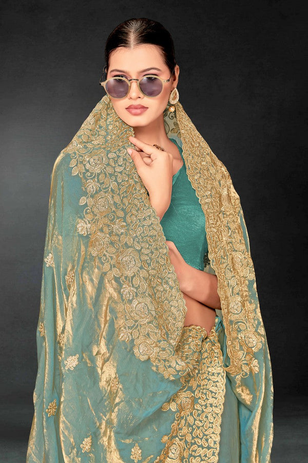 Lovely Turquoise Color Silk Fabric Partywear Saree