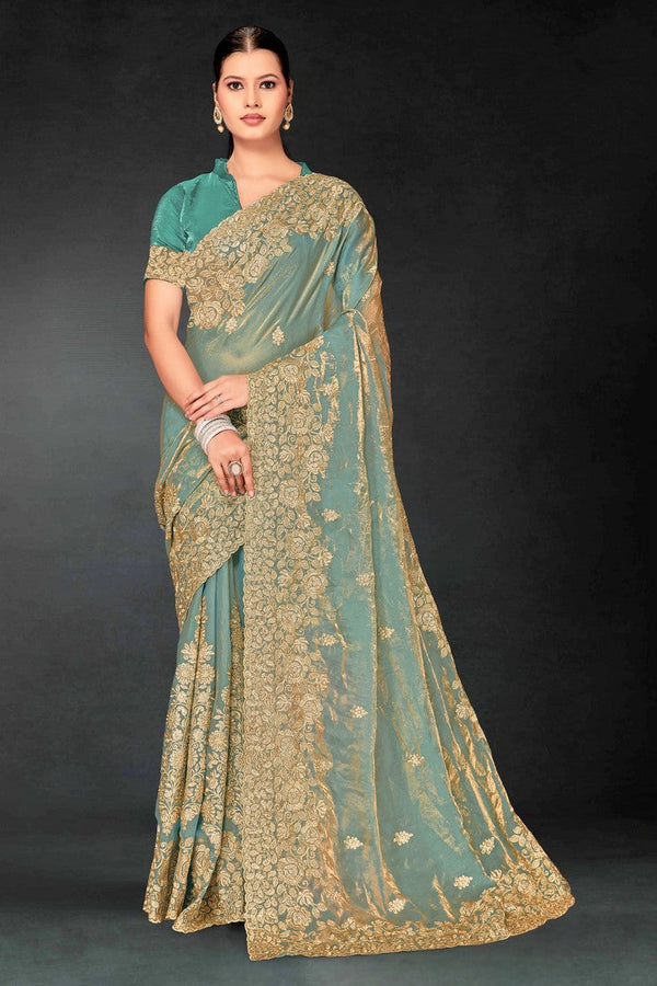 Lovely Turquoise Color Silk Fabric Partywear Saree