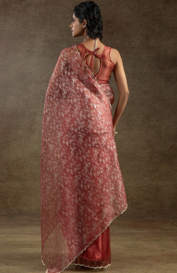 Beauteous Peach Color Tissue Fabric Partywear Saree