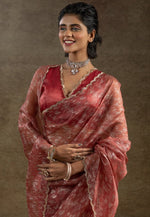 Beauteous Peach Color Tissue Fabric Partywear Saree