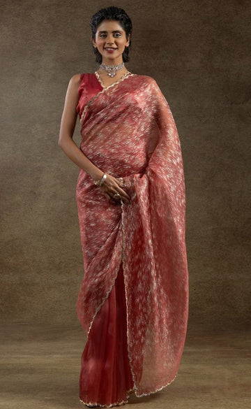 Beauteous Peach Color Tissue Fabric Partywear Saree