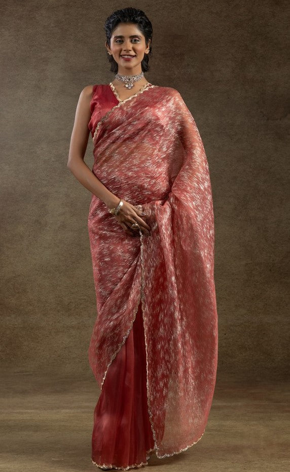 Beauteous Peach Color Tissue Fabric Partywear Saree