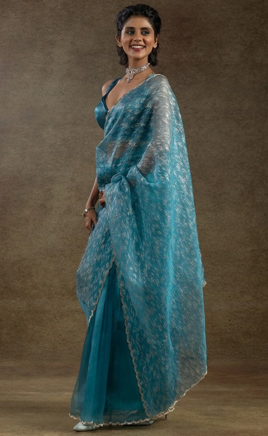 Beauteous Turquoise Color Tissue Fabric Partywear Saree