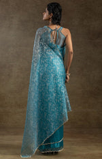Beauteous Turquoise Color Tissue Fabric Partywear Saree