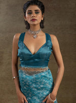 Beauteous Turquoise Color Tissue Fabric Partywear Saree