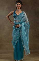 Beauteous Turquoise Color Tissue Fabric Partywear Saree