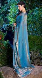 Striking Turquoise Color Silk Fabric Partywear Saree