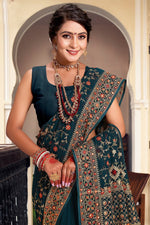 Superb Teal Color Georgette Fabric Partywear Saree