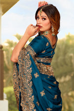 Beauteous Teal Color Satin Fabric Partywear Saree