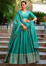 Glowing Turquoise Color Chanderi Fabric Party Wear Lehenga
