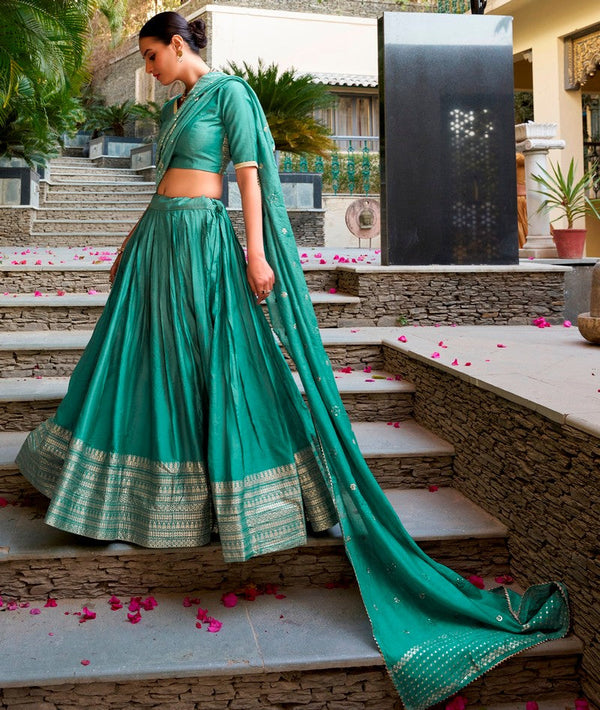 Glowing Turquoise Color Chanderi Fabric Party Wear Lehenga