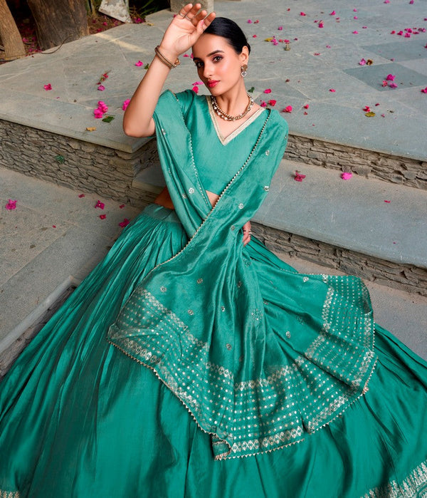 Glowing Turquoise Color Chanderi Fabric Party Wear Lehenga