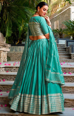 Glowing Turquoise Color Chanderi Fabric Party Wear Lehenga