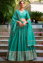 Glowing Turquoise Color Chanderi Fabric Party Wear Lehenga