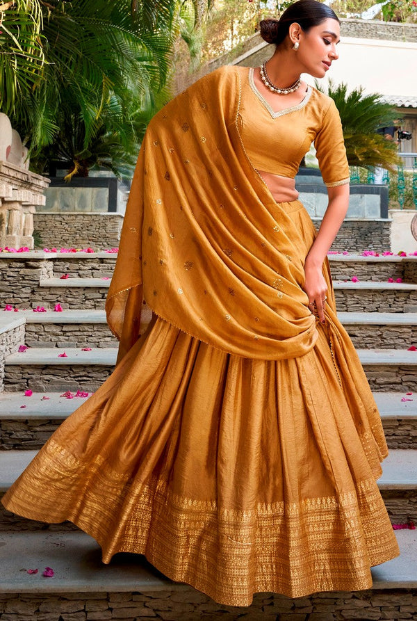 Glowing Mustard Color Chanderi Fabric Party Wear Lehenga