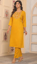 Amazing Yellow Color Rayon Fabric Casual Kurti With Bottom