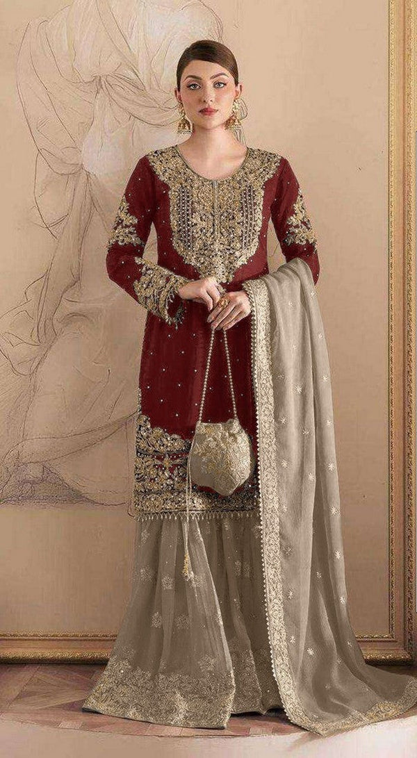 Tasteful Maroon Color Georgette Fabric Partywear Suit