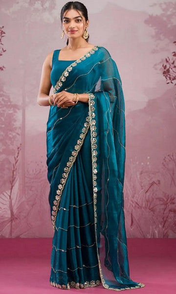 Tempting Teal Color Silk Fabric Partywear Saree