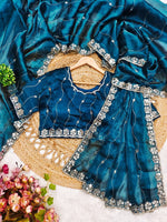 Tempting Teal Color Silk Fabric Partywear Saree