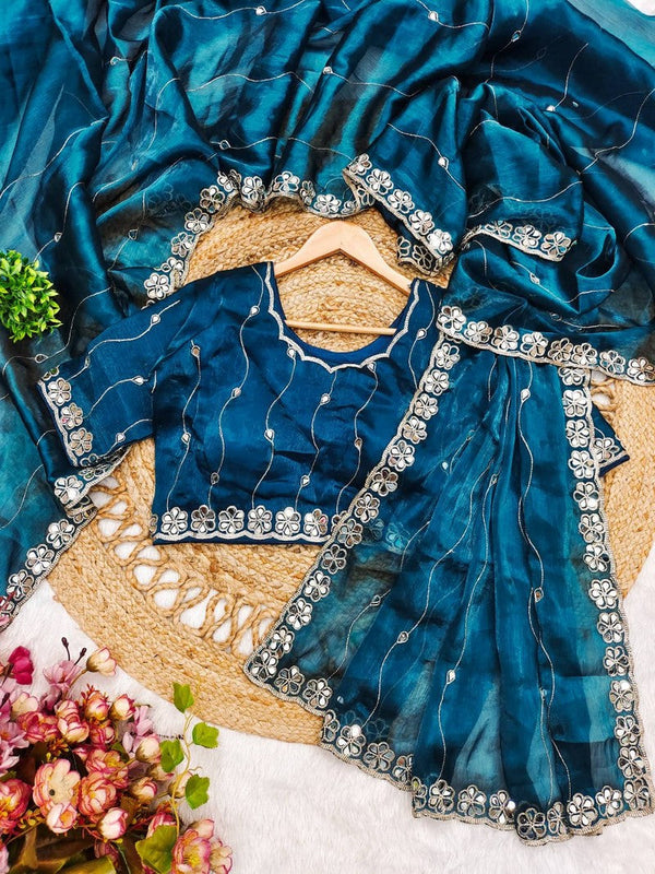 Tempting Teal Color Silk Fabric Partywear Saree