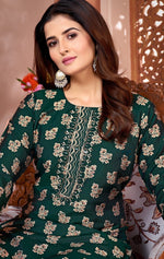 Dazzling Green Color Rayon Fabric Kurti With Bottom
