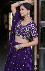 Beautiful Voilet Color Net Fabric Party Wear Lehenga