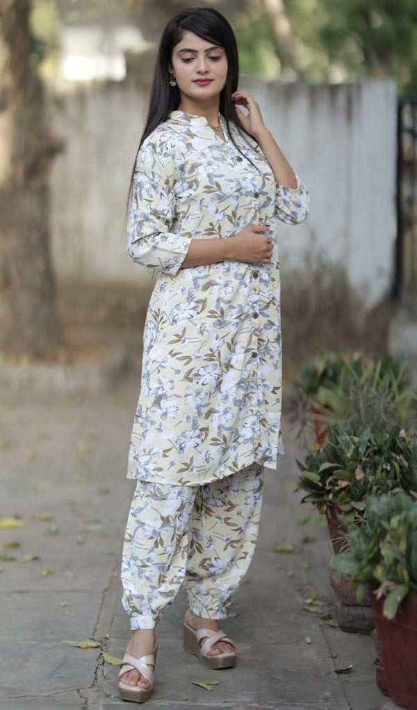 Lovely Cream Color Rayon Fabric Designer Kurti With Bottom