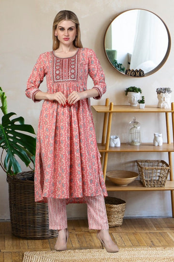 Divine Peach Color Rayon Fabric Casual Suit