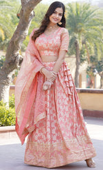 Lovely Peach Color Viscose Fabric Party Wear Lehenga