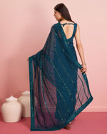 Beauteous Teal Color Georgette Fabric Partywear Saree